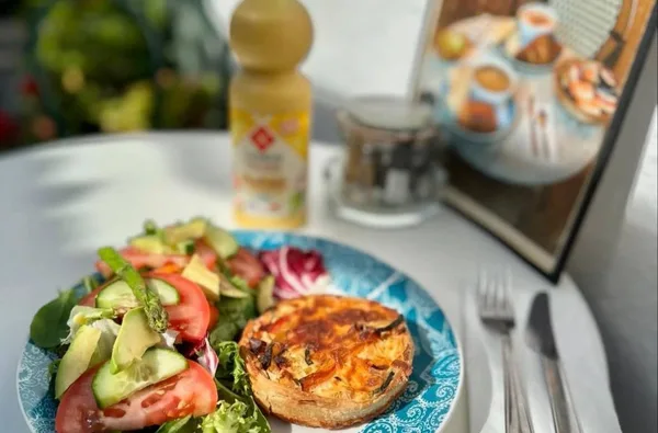 A savoury tart served with salad at Cafe St Pierre.